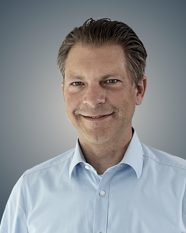 MB_portrait_light_blue_background